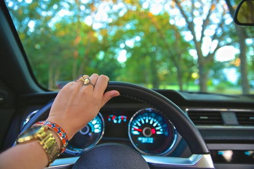 woman arm driving
